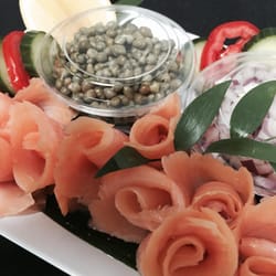 Chantal's Catering - Smoked Salmon served with Red Onions, Capers, Cucumbers, Tomatoes, Hard Boiled Eggs, and Cream Cheese