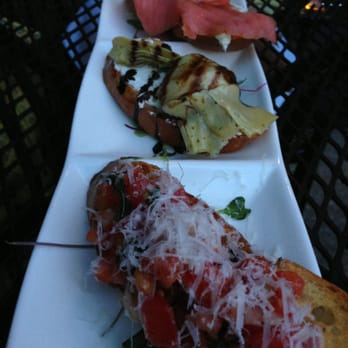Floriana - Crostini trio. From front to back: heirloom tomato, artichoke, smoked salmon - Italian Near Me - Washington, DC, District of Columbia