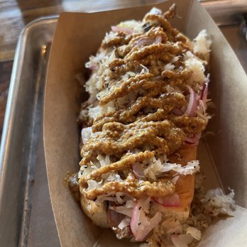 The Missing Link - Bratwurst with grilled onions, sauerkraut and brown mustard - Hot Dogs Near Me - Shreveport, Louisiana The Missing Link - Bratwurst with grilled onions, sauerkraut and brown mustard - Hot Dogs Near Me - Shreveport, Louisiana