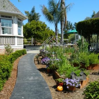 Moran Landscapes - a pathway leading to a house - Landscaping Near Me