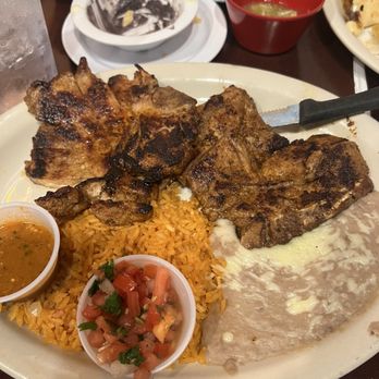 El Patron Bar & Grill - Chuletas, marinated grilled pork chops, served with rice, beans, pico de gallo, hot sauce and tortillas - Mexican Near Me - Helena, Alabama El Patron Bar & Grill - Chuletas, marinated grilled pork chops, served with rice, beans, pico de gallo, hot sauce and tortillas - Mexican Near Me - Helena, Alabama