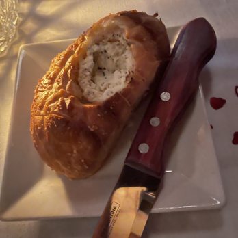 Chatham's Place Restaurant - a loaf of bread and a knife - Desserts Near Me - Orlando, Florida