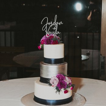 The Cake Shop - a wedding cake on a table - Bakeries Near Me - Apple Valley, California