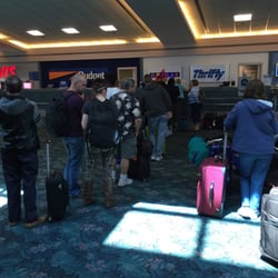Dollar Car Rental - The line. One guy. No cars......fail.