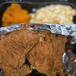 The Spot - Porkchop dinner with potato salad and yams. So good!