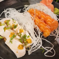 Super white tuna with garlic and salmon sashimi