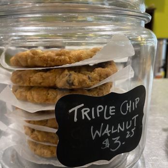 Relish - Cookies - A clear glass jar holds several triple chip walnut cookies, with a black label displaying the cookie name and price. - Bakeries Near Me - Provincetown, Massachusetts