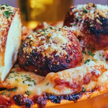 Favorite Pizza - a plate of meatballs and bread - Pizza Near Me - Austin, Texas Favorite Pizza - a plate of meatballs and bread - Pizza Near Me - Austin, Texas