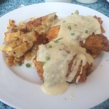Iron Rooster - Buttermilk fried chicken and cornmeal waffles with black pepper pan gravy - Cocktail Bars Near Me - Annapolis, Maryland