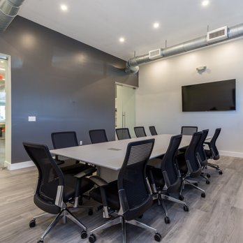 A-Z Builds - a conference room with a flat screen tv - General Contractors Near Me - North Miami Beach, Florida A-Z Builds - a conference room with a flat screen tv - General Contractors Near Me - North Miami Beach, Florida