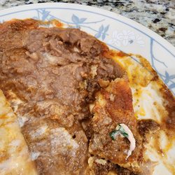 El Azteca Mexican Restaurant - Part of the runny greasy plate we could not finish