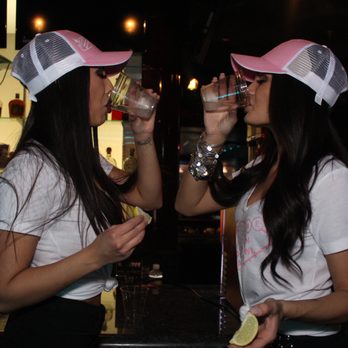 Downtown Party Crawl - two women drinking a drink - Club Crawl Near Me - Las Vegas, Nevada Downtown Party Crawl - two women drinking a drink - Club Crawl Near Me - Las Vegas, Nevada