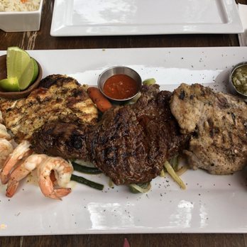 Los Planes Gourmet - a steak and shrimp platter - Salvadoran Near Me - Montreal, Quebec Los Planes Gourmet - a steak and shrimp platter - Salvadoran Near Me - Montreal, Quebec