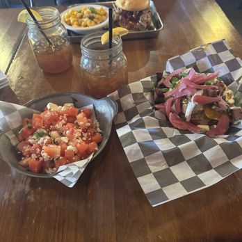 Biscuits and Bourbon - Watermelon salad and baked potato with brisket - New American Near Me - Henderson, Nevada Biscuits and Bourbon - Watermelon salad and baked potato with brisket - New American Near Me - Henderson, Nevada
