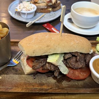 Finnegans Bar & Restaurant - THE Steak Sandwich. Paired with those big chips -- Nearly sublime. - Pubs Near Me - Annacotty, LK Finnegans Bar & Restaurant - THE Steak Sandwich. Paired with those big chips -- Nearly sublime. - Pubs Near Me - Annacotty, LK