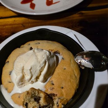 Prime Steakhouse - Desserts again! Giant cookie with ice cream and a delicious strawberry cheesecake. Save room for dessert! - Bars Near Me - Redmond, Washington