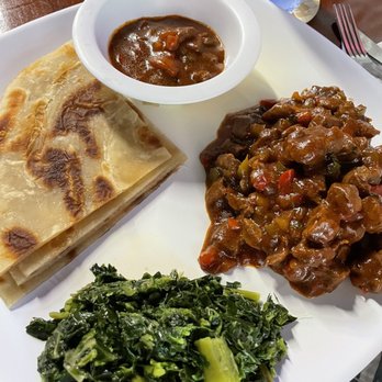 Rafiki Restaurant & Lounge - Flat bread, beef stew, and collard greens. - Lounges Near Me - Kent, Washington Rafiki Restaurant & Lounge - Flat bread, beef stew, and collard greens. - Lounges Near Me - Kent, Washington