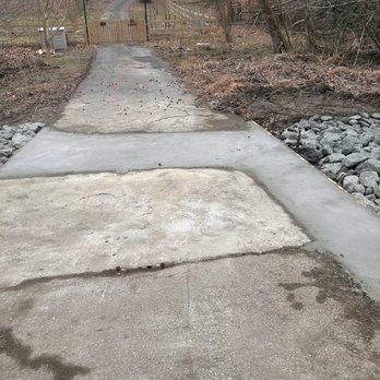 Honey Cove Landscaping and Tree Services - a concrete walkway - Landscaping Near Me Honey Cove Landscaping and Tree Services - a concrete walkway - Landscaping Near Me