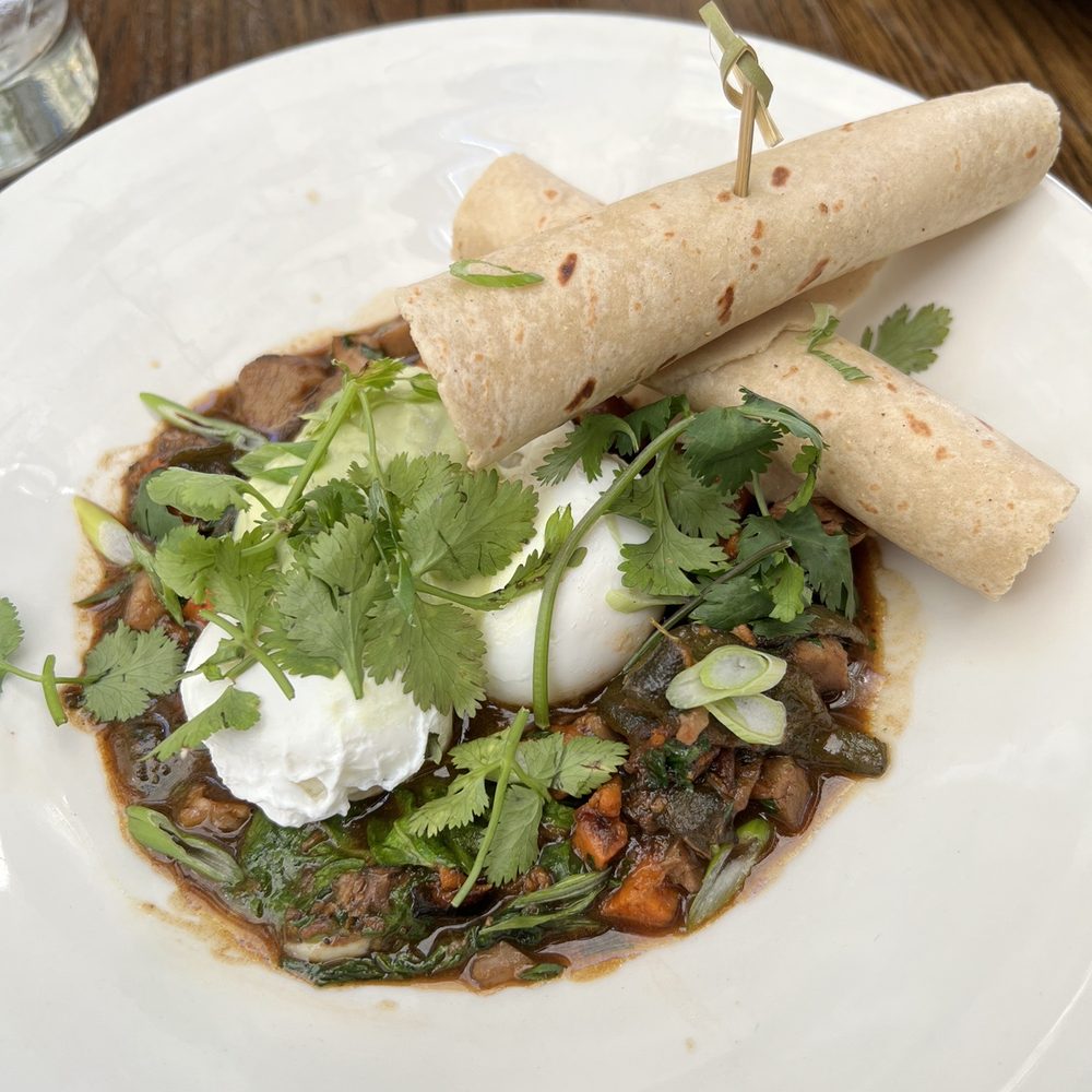 AOC - green chile carnitas hash, so good! Get it! - Cocktail Bars Near Me - Los Angeles, California