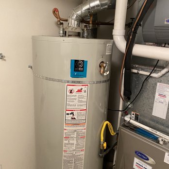 Aquious Tankless Solutions - BEFORE: Big Water heater taking up room - Water Heater Installation/Repair Near Me - Reno, Nevada