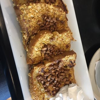 Blossoms Restaurant - The French toast!!Candied walnuts and captain crunch on top OH MY! I had mine without bacon but I'm sure it's amazing with  only $5.99 - American Near Me - Leland, North Carolina