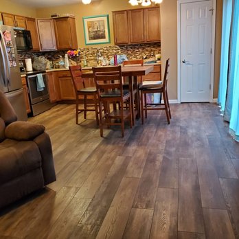 Lehman Floor Covering - a living room and kitchen - Flooring Near Me - Huntington, Indiana Lehman Floor Covering - a living room and kitchen - Flooring Near Me - Huntington, Indiana