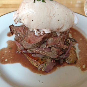 Thistle - Steak over fingerling potatoes topped with poached duck egg and red wine sauce - Tapas/Small Plates Near Me - McMinnville, Oregon Thistle - Steak over fingerling potatoes topped with poached duck egg and red wine sauce - Tapas/Small Plates Near Me - McMinnville, Oregon