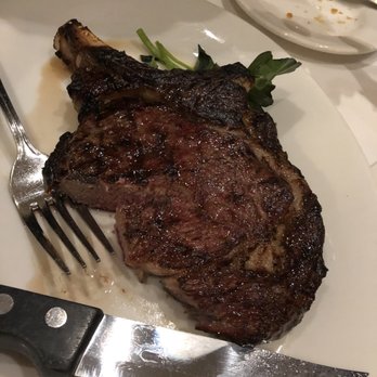 Shula's Steak House - Cowboy ribeye - Steakhouses Near Me - Naples, Florida Shula's Steak House - Cowboy ribeye - Steakhouses Near Me - Naples, Florida