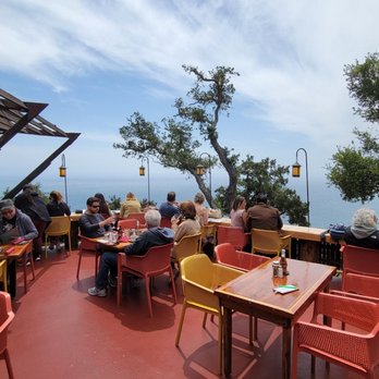 Nepenthe - Outdoor seating near the back. - New American Near Me - Big Sur, California Nepenthe - Outdoor seating near the back. - New American Near Me - Big Sur, California
