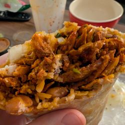 Tacos el Trébol - All Pastor burrito, $10. Packed with flavor.