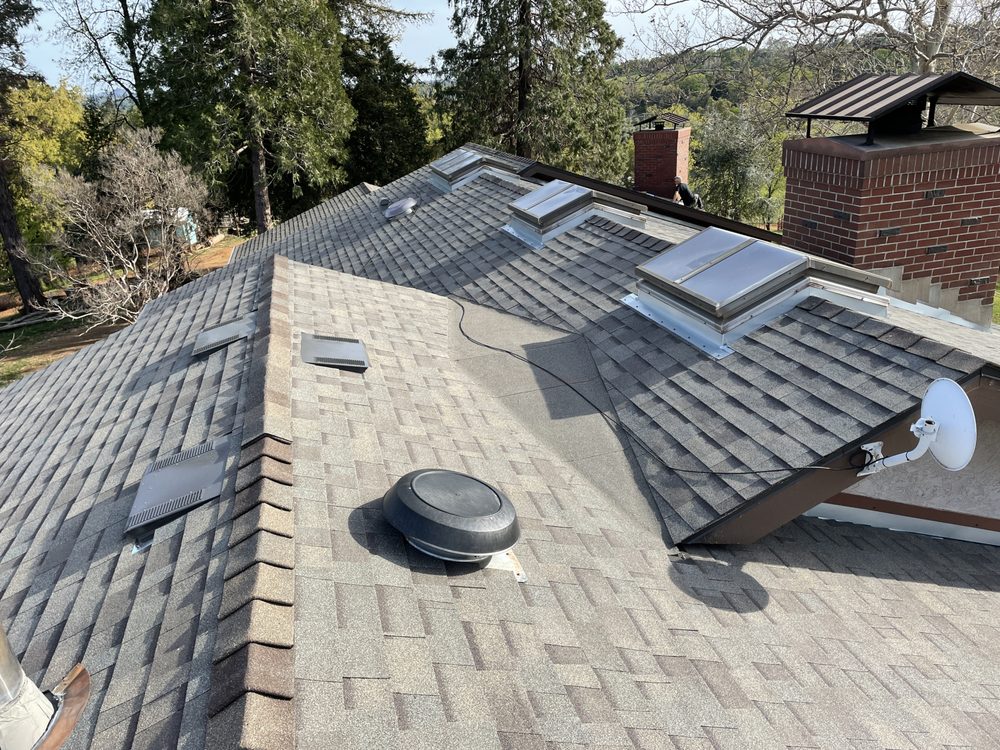 Slide of Triark Roofing