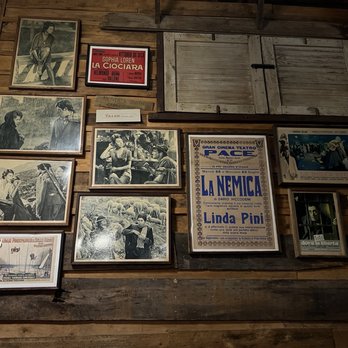 Cavatore Italian Restaurant - a wall of old posters - Italian Near Me - Houston, Texas Cavatore Italian Restaurant - a wall of old posters - Italian Near Me - Houston, Texas