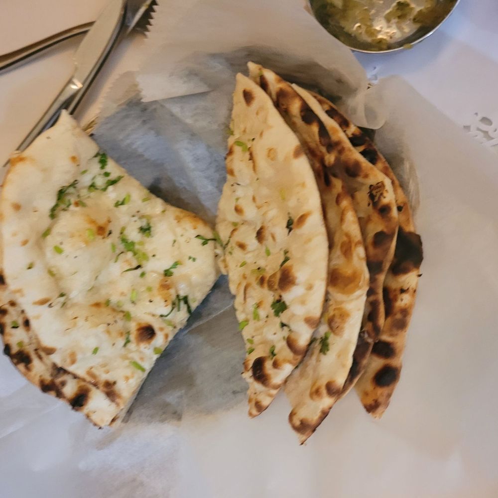 Indigo - Garlic Naan bead.... need I say more yummy ! - Indian Near Me - Rehoboth Beach, Delaware Indigo - Garlic Naan bead.... need I say more yummy ! - Indian Near Me - Rehoboth Beach, Delaware