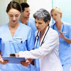 RWJ University Hospital Somerset - A pair of doctors reviewing a chart.