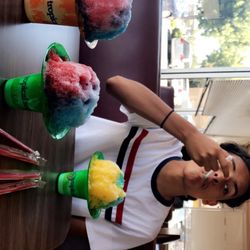(left) large $5, and other two smalls $3 . huge portions not stingy with the flavored syrup at all !  many good flavors the choose from !!