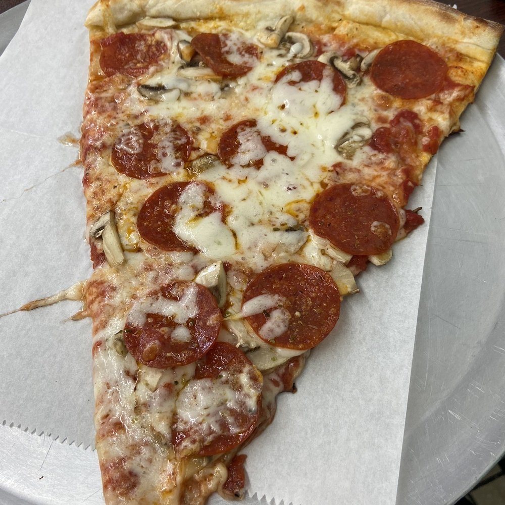 Lunch slice with pepperoni and mushroom. Small up-charge for the mushrooms. So good!