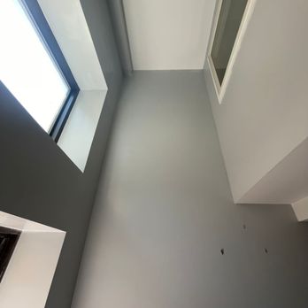 Sla Contractors - a view of a room with a skylight - General Contractors Near Me
