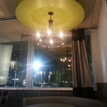 McDonald's - a large yellow umbrella hanging from the ceiling - Burgers Near Me - Raleigh, North Carolina McDonald's - a large yellow umbrella hanging from the ceiling - Burgers Near Me - Raleigh, North Carolina