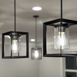 Peach Electric - Pendant light fixture. They had to create hole in ceiling and run wiring.