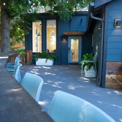 Large, outdoor porch seating at the Unravel Cafe.