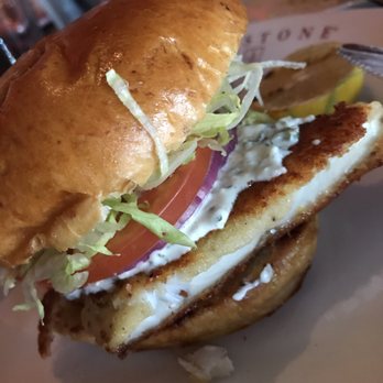 Redstone American Grill - Parmesan crusted walleye sandwich - Steakhouses Near Me - Maple Grove, Minnesota Redstone American Grill - Parmesan crusted walleye sandwich - Steakhouses Near Me - Maple Grove, Minnesota