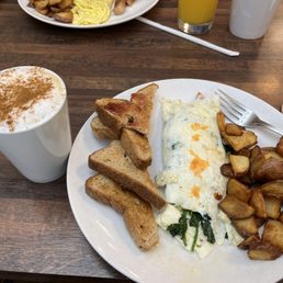 Greek egg white omelet and a double shot cappuccino Greek egg white omelet and a double shot cappuccino