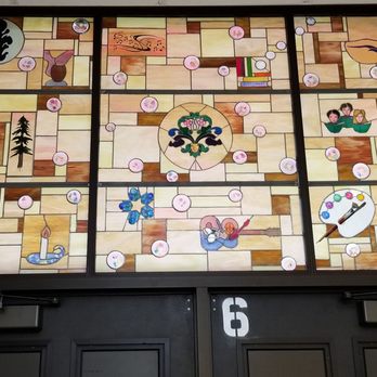 Bonifas Fine Arts Center - Stained glass over the front entry - Venues & Event Spaces Near Me - Escanaba, Michigan Bonifas Fine Arts Center - Stained glass over the front entry - Venues & Event Spaces Near Me - Escanaba, Michigan