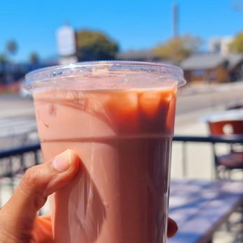 Naan Stop - a hand holding a cup of bubble tea - Indian Near Me - Isla Vista, California Naan Stop - a hand holding a cup of bubble tea - Indian Near Me - Isla Vista, California