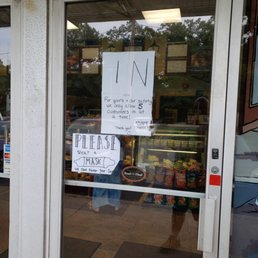 a sign in the window of a store