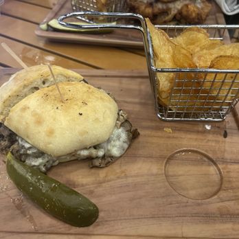 Finney's Crafthouse - Oceanside - Prime rib cheesesteak, fresh chips and dill pickle - New American Near Me - Oceanside, California