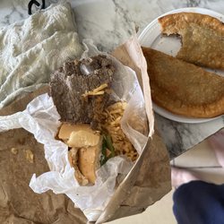 La Catalana Bakery & Restaurant - Steak sandwich was so old. empanada was old , oil it was all mushy and tasted liked old oil. I was so sick after I ate this.