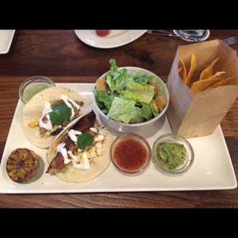 Del Frisco's Grille - Fish tacos with a side Cesar salad and some tortilla chips. $12 - New American Near Me - Hoboken, New Jersey