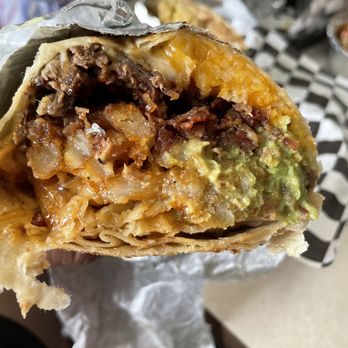 Stuffed - Cali Twist + Guac - Mexican Near Me - San Antonio, Texas Stuffed - Cali Twist + Guac - Mexican Near Me - San Antonio, Texas