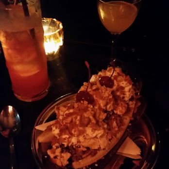 Foreign National - Singapore Sling (left) and Foreign National (right). Always have dessert with drinks! -- chocolate banana splits on the bottom. - Cocktail Bars Near Me - Seattle, Washington Foreign National - Singapore Sling (left) and Foreign National (right). Always have dessert with drinks! -- chocolate banana splits on the bottom. - Cocktail Bars Near Me - Seattle, Washington